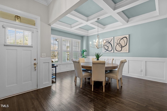 dining area with beam ceiling, a wealth of natural light, crown molding, and dark wood-type flooring