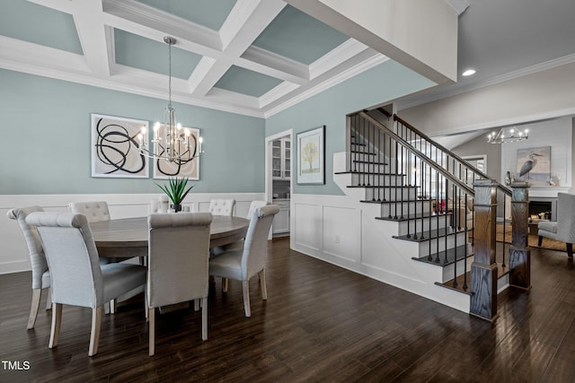 dining area with coffered ceiling, crown molding, dark hardwood / wood-style floors, beamed ceiling, and a notable chandelier