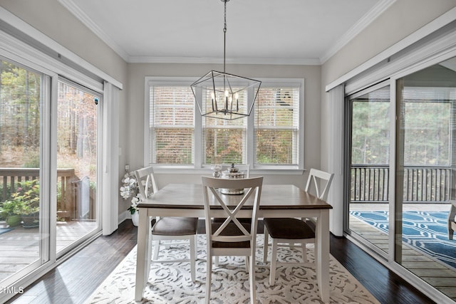 sunroom / solarium with an inviting chandelier