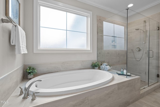 181 Colonial Ridge Dr, Pittsboro, NC 27312 - full bathroom with a stall shower, a garden tub, and crown molding