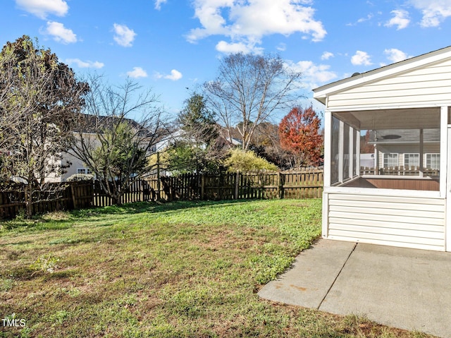 view of yard featuring a sunroom