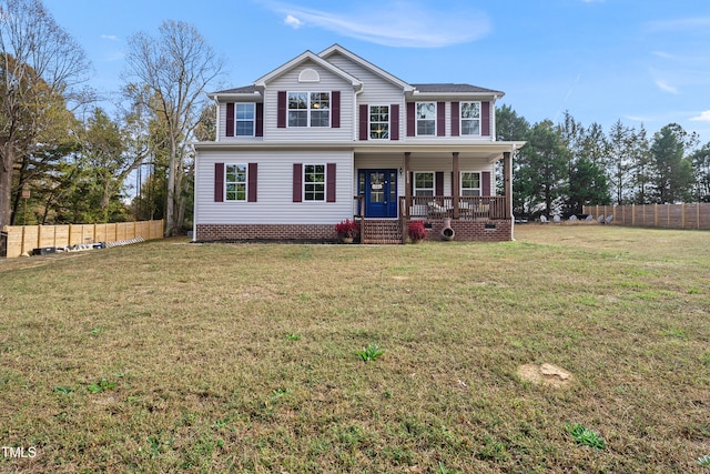 view of front of home with a porch and a front lawn