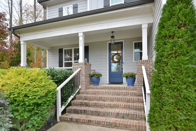 doorway to property featuring a porch