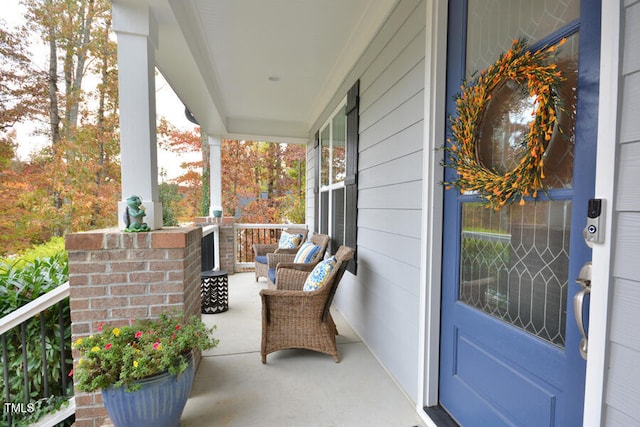 balcony featuring covered porch