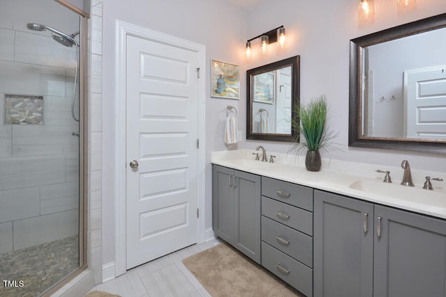 bathroom with vanity and an enclosed shower