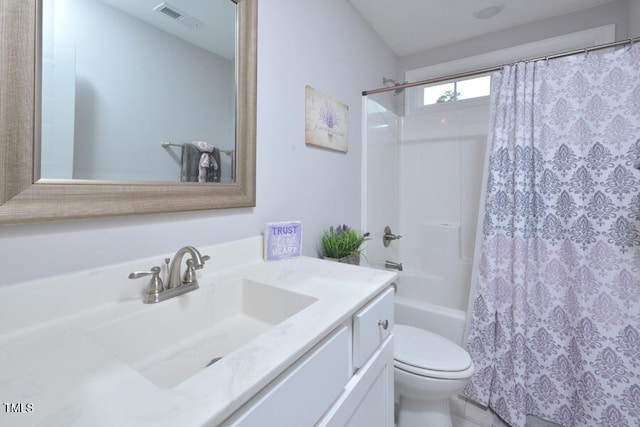 full bathroom with toilet, vanity, and shower / bath combo with shower curtain