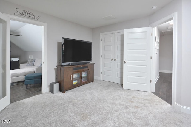 living room with light colored carpet