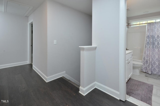 hall featuring dark hardwood / wood-style flooring