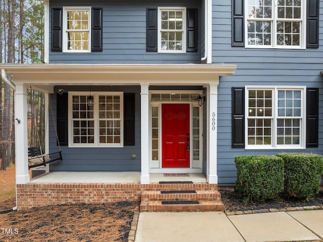 5600 Thornburg Dr, Wake Forest, NC 27587 - view of exterior entry featuring covered porch