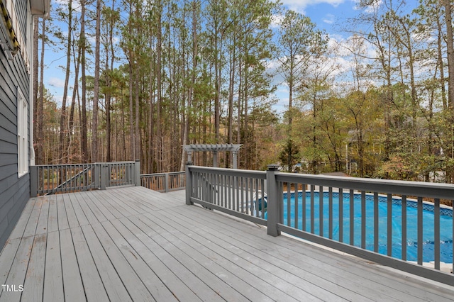 wooden deck with a pergola