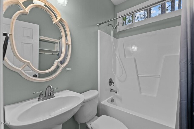 5600 Thornburg Dr, Wake Forest, NC 27587 - bathroom with a sink, shower / bath combo, and toilet