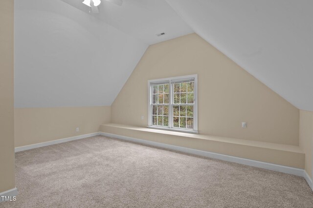 5600 Thornburg Dr, Wake Forest, NC 27587 - additional living space with carpet flooring, lofted ceiling, baseboards, and ceiling fan