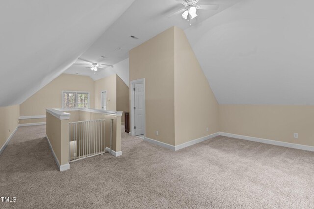 5600 Thornburg Dr, Wake Forest, NC 27587 - additional living space featuring ceiling fan, lofted ceiling, light colored carpet, and baseboards