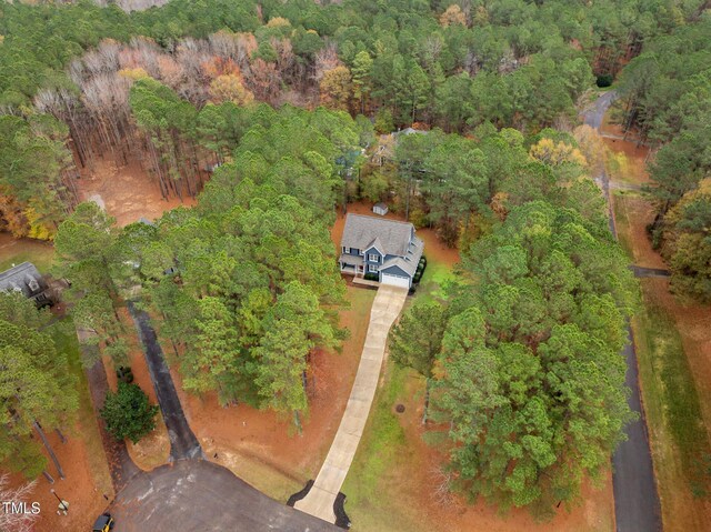 5600 Thornburg Dr, Wake Forest, NC 27587 - aerial overview of property's location with a heavily wooded area