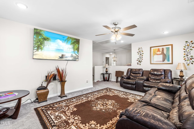 living room with ceiling fan and carpet floors