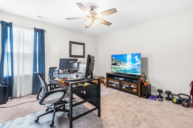 office space with carpet flooring and ceiling fan