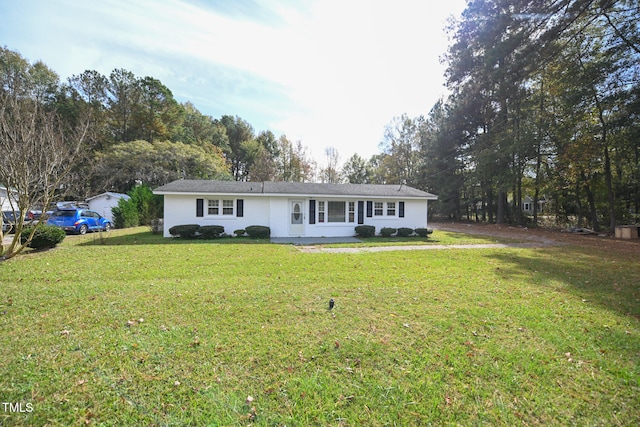 ranch-style house with a front lawn