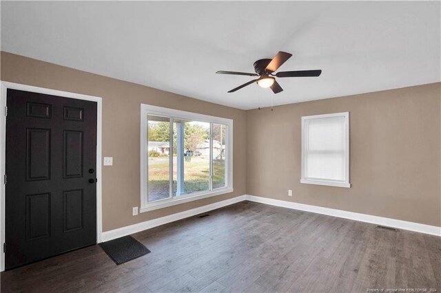 entryway with ceiling fan and dark hardwood / wood-style floors