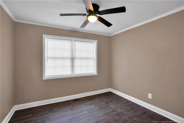 spare room with ornamental molding, ceiling fan, and dark hardwood / wood-style floors