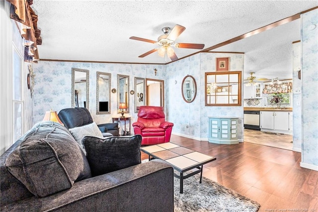 living room with lofted ceiling, wood-type flooring, and a textured ceiling