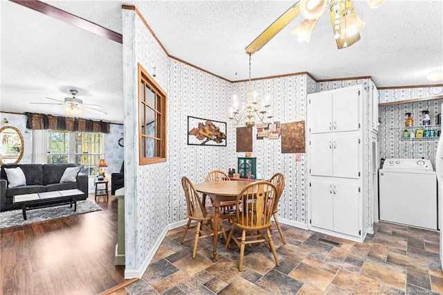 dining space featuring ceiling fan, dark hardwood / wood-style flooring, crown molding, a textured ceiling, and washer / dryer