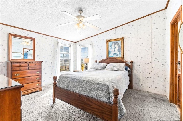 bedroom with ceiling fan, crown molding, carpet floors, vaulted ceiling, and a textured ceiling