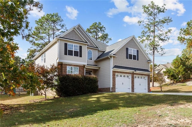 craftsman house with a garage and a front yard