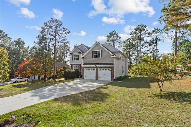 view of front facade with a garage and a front yard