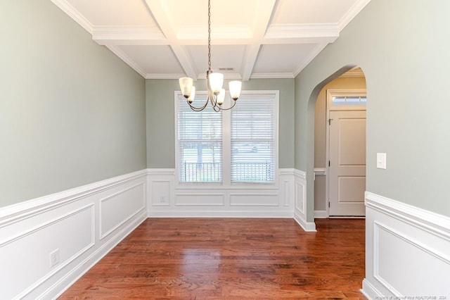 unfurnished dining area with dark hardwood / wood-style flooring, beamed ceiling, crown molding, and coffered ceiling