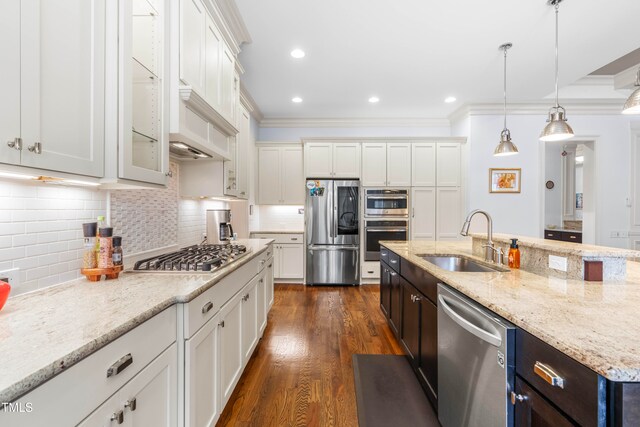 kitchen featuring white cabinets and appliances with stainless steel finishes