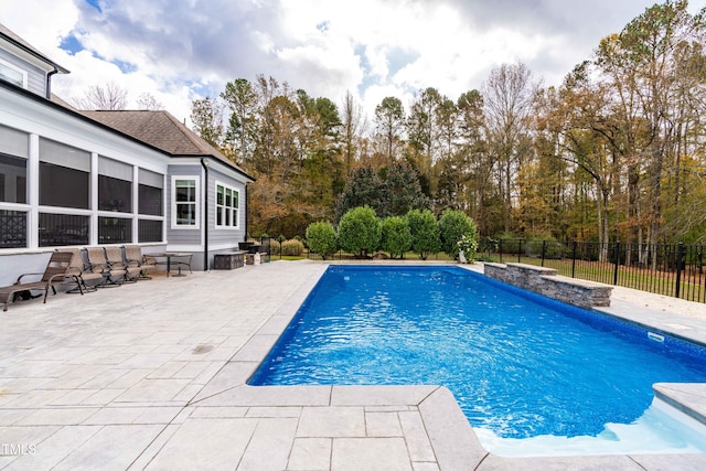 view of pool featuring a patio area