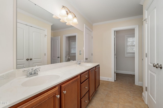 bathroom with vanity, tile patterned floors, and crown molding