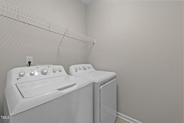 washroom featuring separate washer and dryer