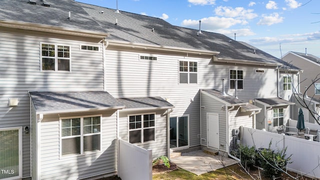 rear view of property with a patio