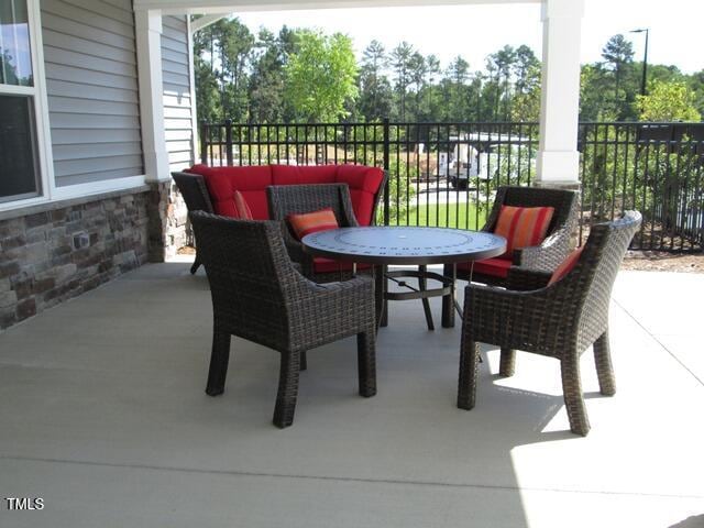 balcony featuring a patio area