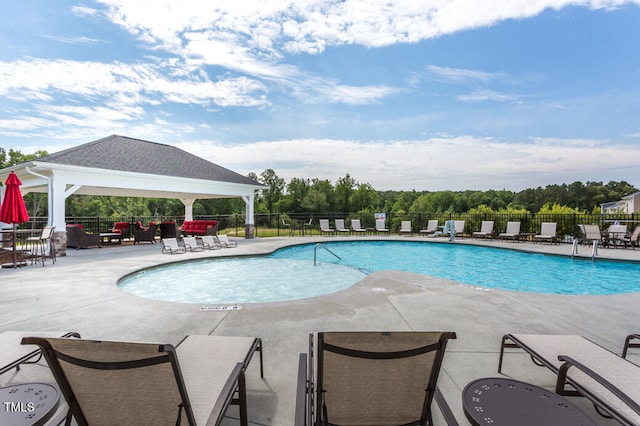 view of pool with a gazebo and a patio