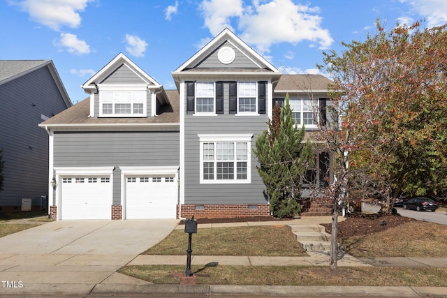 view of front of home with a garage