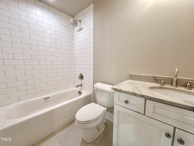 full bathroom featuring toilet, tile patterned flooring, vanity, and tiled shower / bath