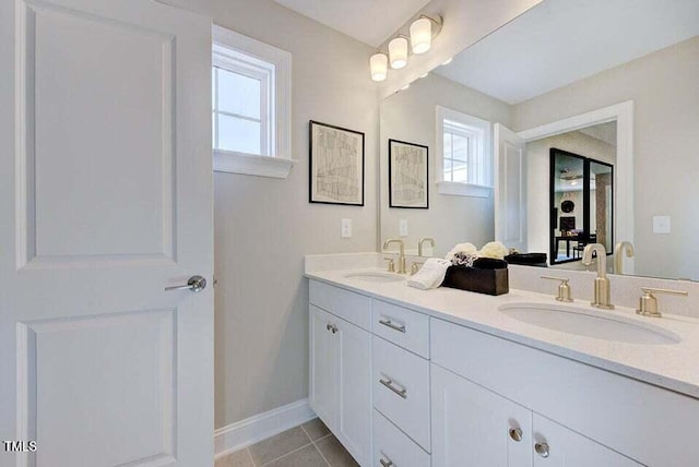 bathroom with vanity and tile patterned floors