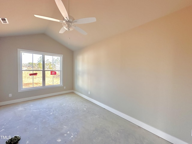 empty room featuring ceiling fan and lofted ceiling