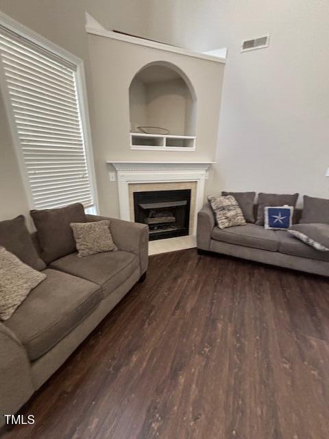 living room with dark wood-type flooring