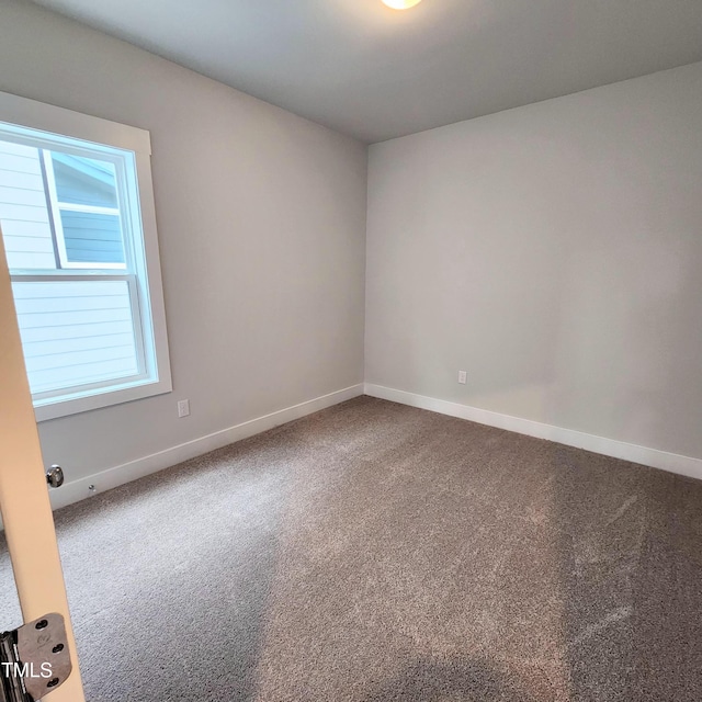 view of carpeted spare room