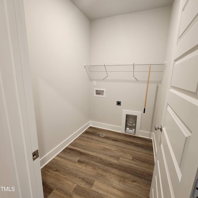 clothes washing area with dark hardwood / wood-style floors, hookup for a washing machine, and hookup for an electric dryer