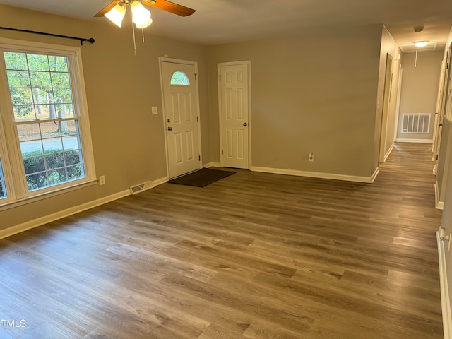 foyer with hardwood / wood-style floors and ceiling fan