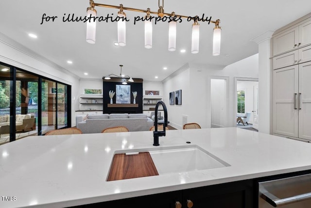 kitchen with pendant lighting, a large island, crown molding, dishwasher, and light stone countertops