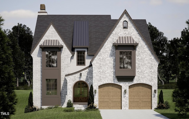 view of front facade with a garage and a front lawn