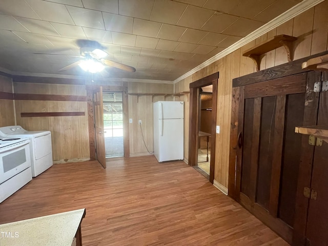 laundry area featuring wooden walls, ornamental molding, ceiling fan, light wood-type flooring, and washer / clothes dryer