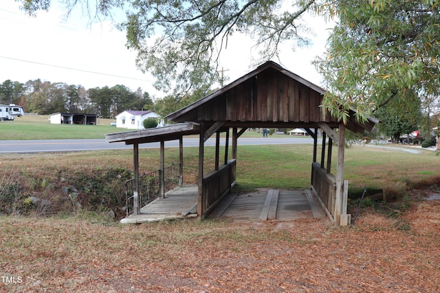 surrounding community featuring a yard and a gazebo