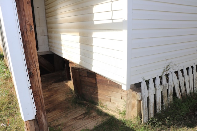 exterior details featuring wooden walls