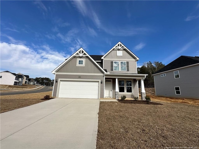 craftsman house featuring a garage